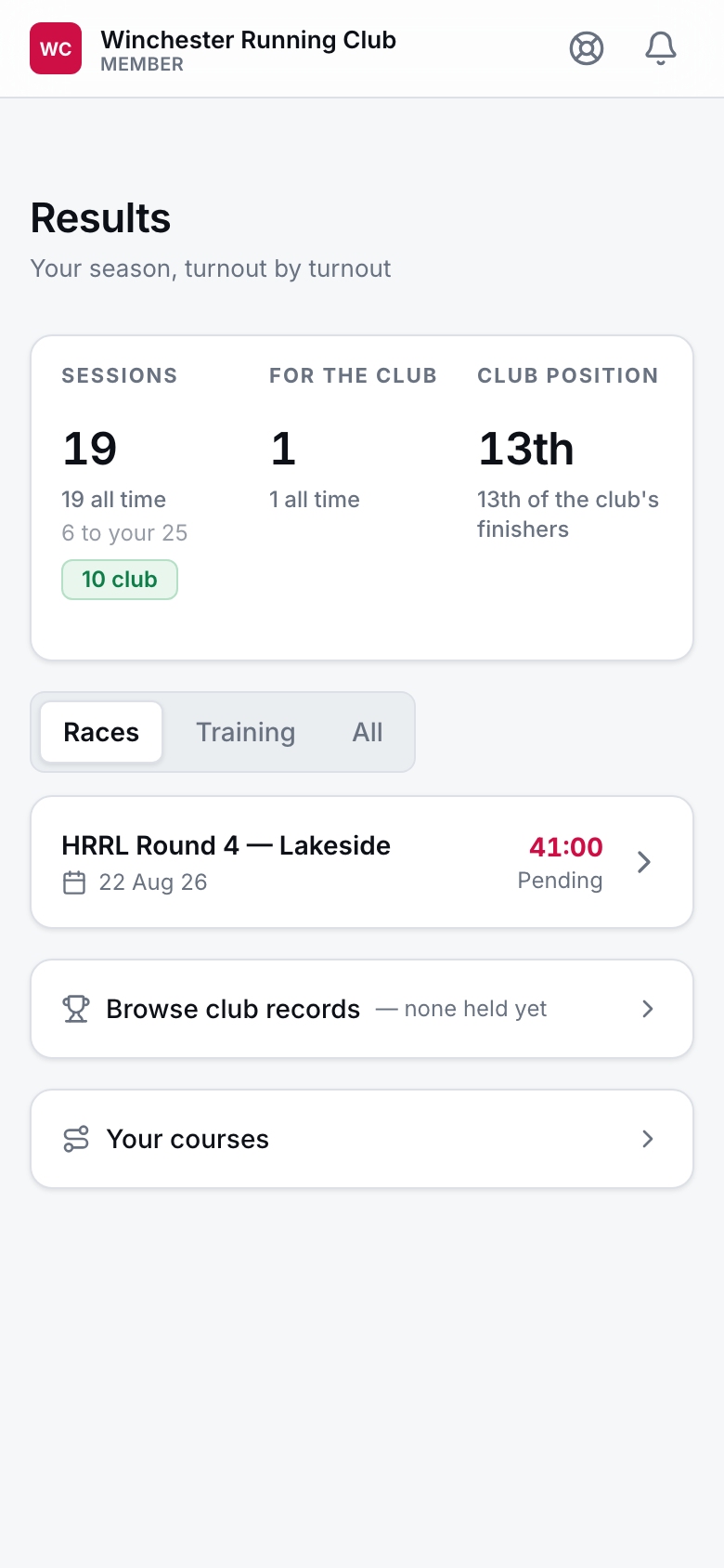 A member's results on a phone: sessions attended this season, races run, and club position.